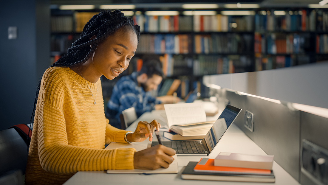 Black voices: A student of Black heritage studying in the library