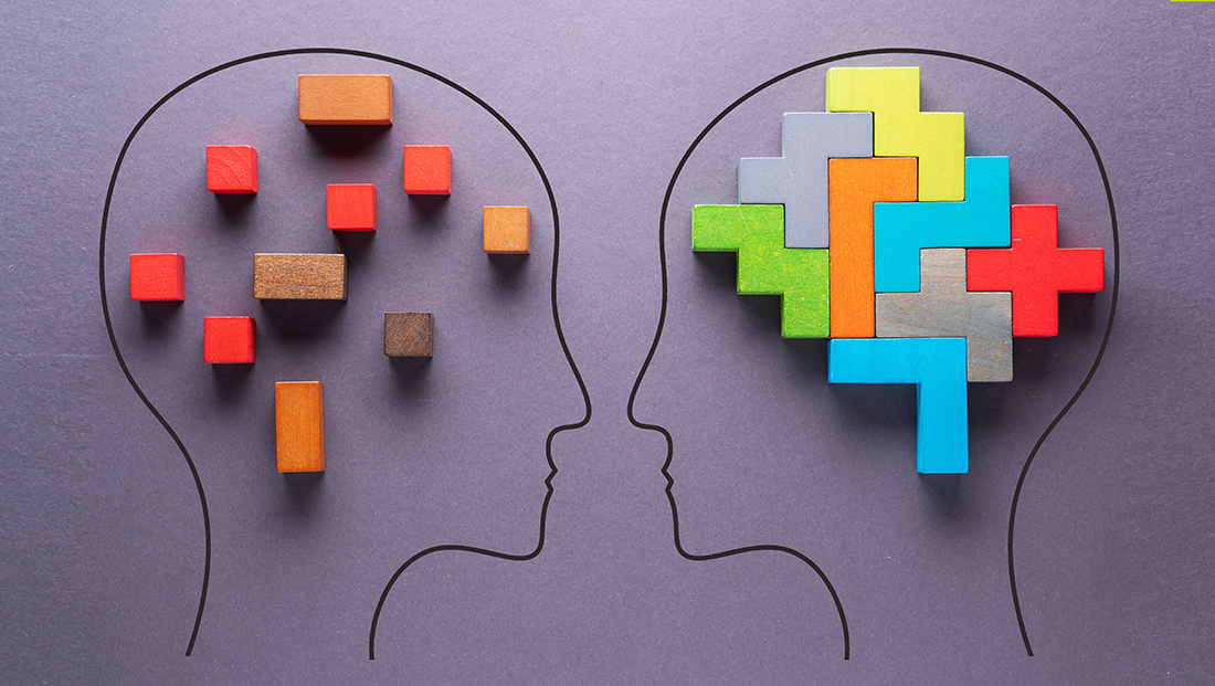 Neurodiverse talent: Two heads with colourful blocks facing each other