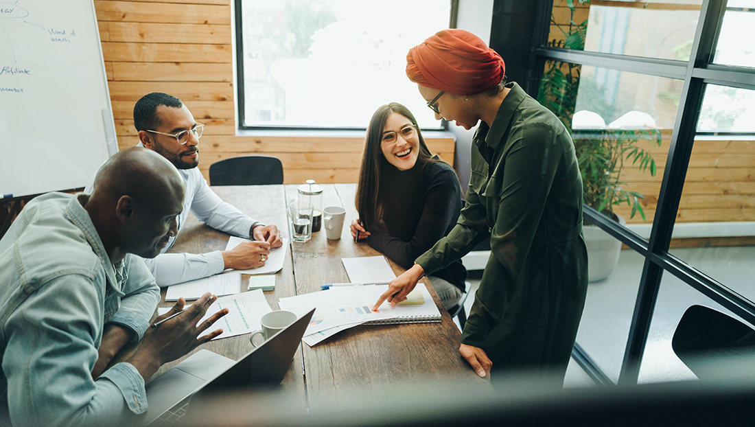 increase diversity: diverse team working together in the office