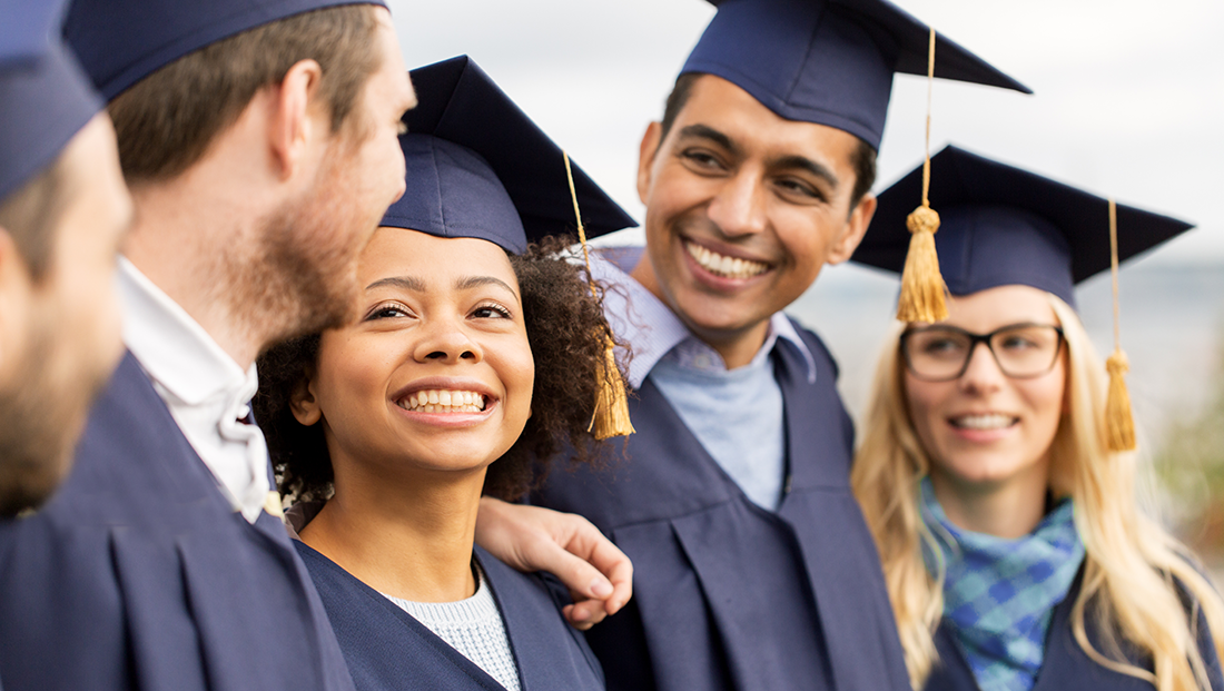 predictions for the graduate labour market: a group of young people at a graduate ceremony