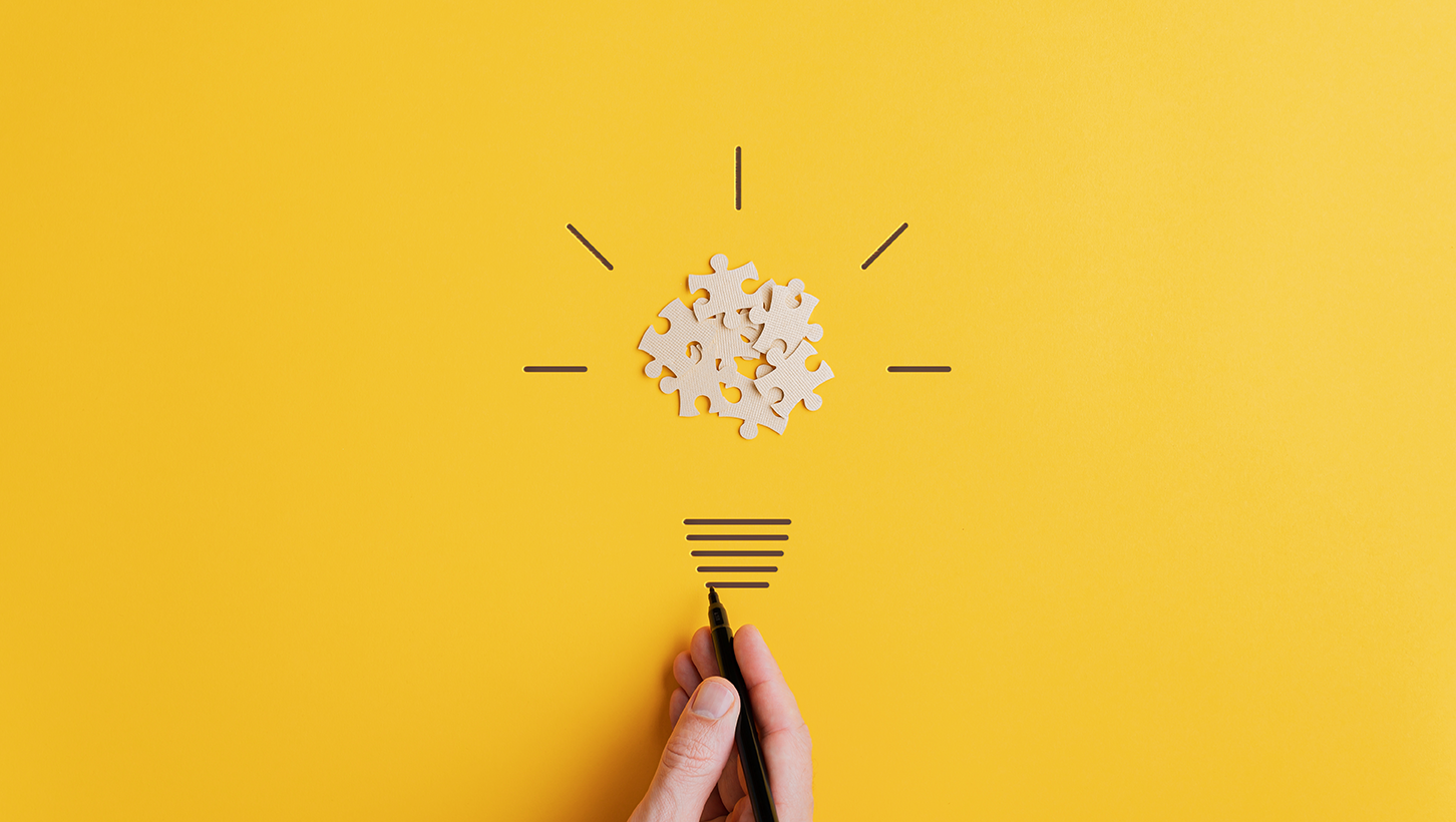 How to develop a successful early career strategy: jigsaw puzzles forming a lightbulb